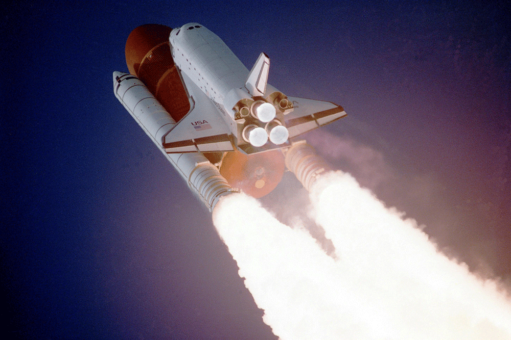 Space shuttle launching into the sky/space
